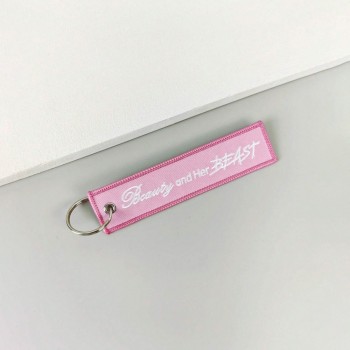 Breloc moto textil "Beauty and her Beast" brodat Breloc moto textil "Beauty and her Beast" brodat