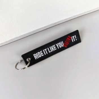 Breloc moto textil "Ride it like you stole it" brodat Breloc moto textil "Ride it like you stole it" brodat